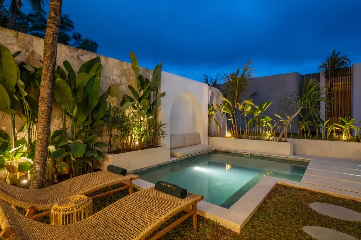 Pool and loungers at dusk at a villa Premier manages